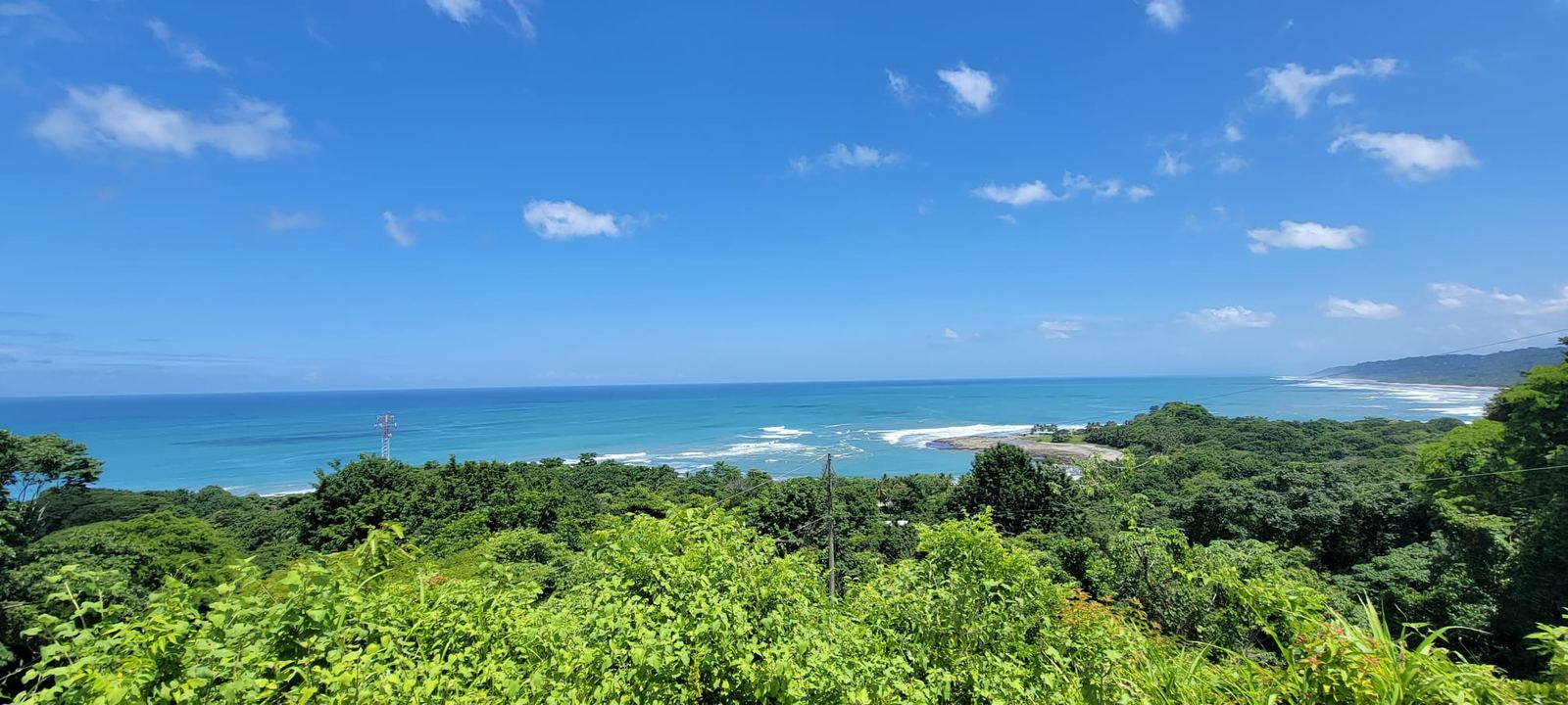 Aerial panorama of the Mal Pais coastline from the hilltop